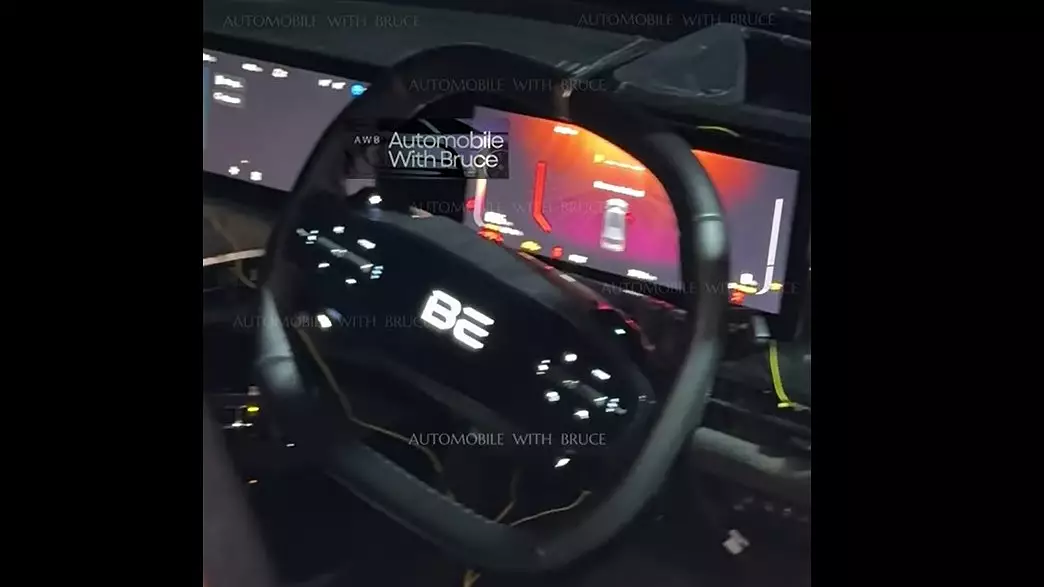 mahindra be05 steering wheel2 Mahindra BE.05 Spied Testing, Expected Price, Range, and Launch Date https://e-vehicleinfo.com/mahindra-be-05-spied-testing-expected-price-range-and-launch-date/