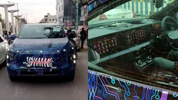 Mahindra XUV e9 electric SUV spotted in latest spy shot with 3 giant display screens on dashboard